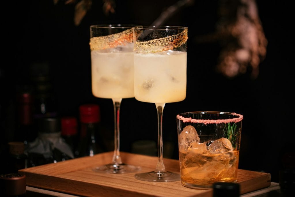 copper city hotel and bar menu item an image of cocktail on table